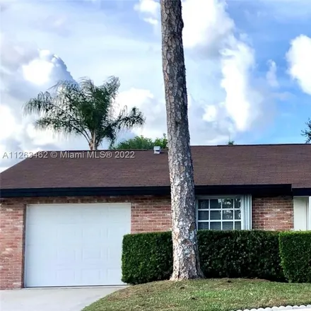 Rent this 4 bed house on 9888 Honeysuckle Avenue in North Palm Beach, FL 33410