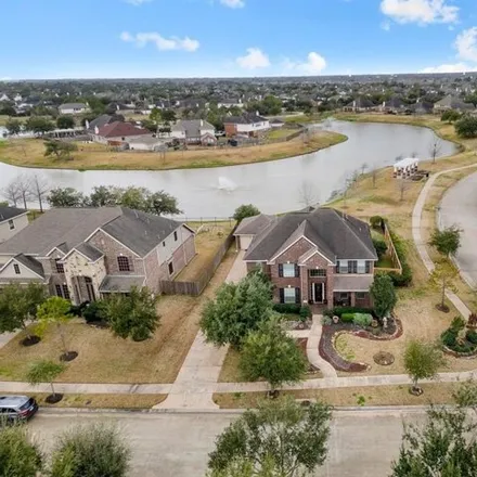 Buy this 4 bed house on 13706 Savannah Cove Lane in Brazoria County, TX 77583