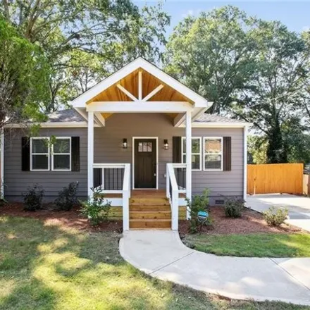 Buy this 4 bed house on 1364 Almont Drive Southwest in Atlanta, GA 30310