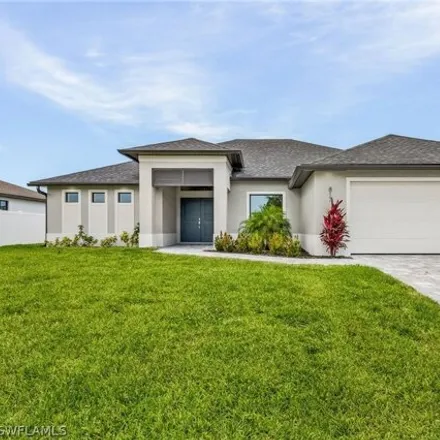 Buy this 3 bed house on 817 Sw Embers Ter in Cape Coral, Florida