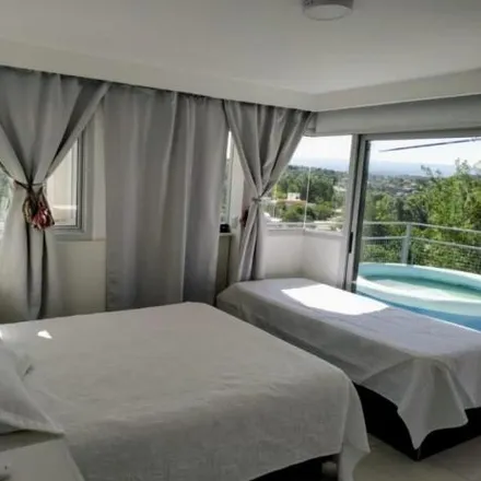 Buy this 3 bed house on Donizetti in Departamento Punilla, Villa Carlos Paz