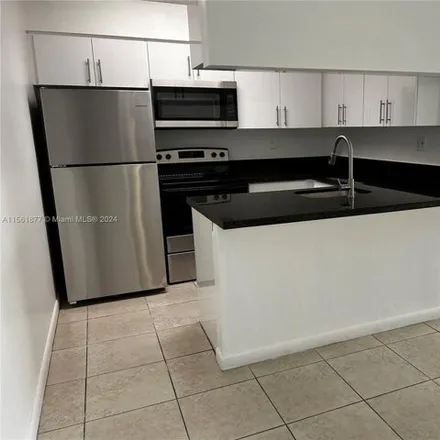 Rent this 1 bed condo on 6725 Northwest 174th Terrace in Miami-Dade County, FL 33015