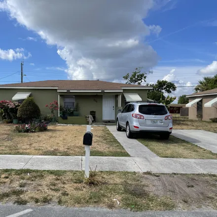 Buy this 3 bed house on 1315 15th Avenue South in Lake Worth Beach, FL 33460