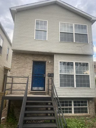 Buy this 3 bed house on 4751 South Wolcott Avenue in Chicago, IL 60609