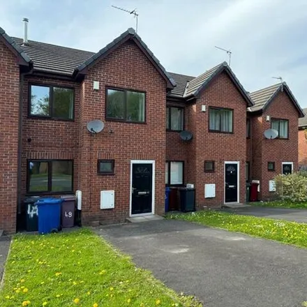 Rent this 3 bed townhouse on Cranbrook Street in Blackburn, BB2 4AS