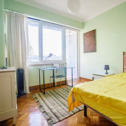 Rent this 2 bed room on Rua Bulhão Pato in 1749-086 Lisbon, Portugal
