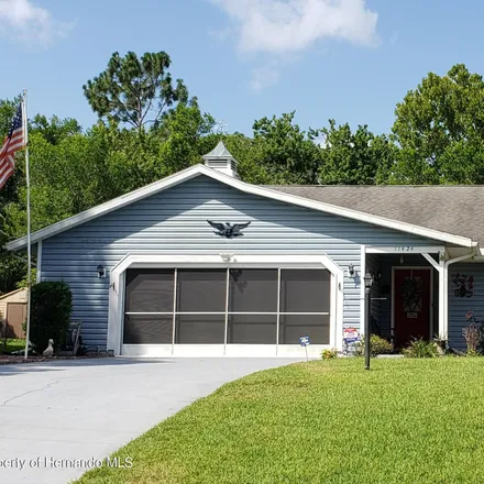 Buy this 3 bed house on 11424 Genter Drive in Spring Hill, FL 34609