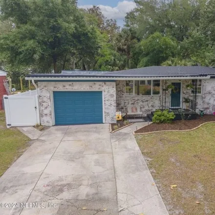 Buy this 4 bed house on 1777 Shadowood Lane in Jacksonville, FL 32207