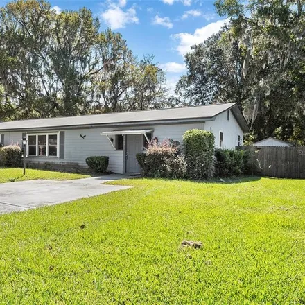 Buy this 4 bed house on 6022 Northwest 4th Place in Gainesville, FL 32607