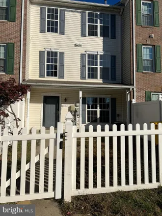 Rent this 3 bed townhouse on 1810 Watch House Circle South in Meade Village, Severn