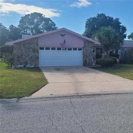 Buy this 3 bed house on 4414 Dewey Drive in Elfers, FL 34652