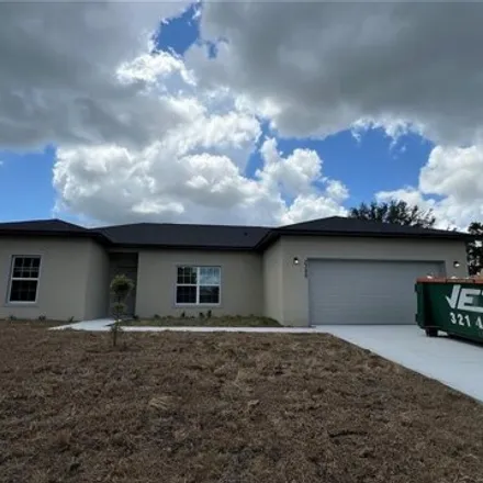 Rent this 3 bed house on 2383 Ramsey Road Southeast in Palm Bay, FL 32909