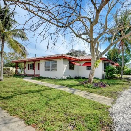 Buy this 4 bed house on 955 22nd Avenue North in Lake Worth Beach, FL 33460