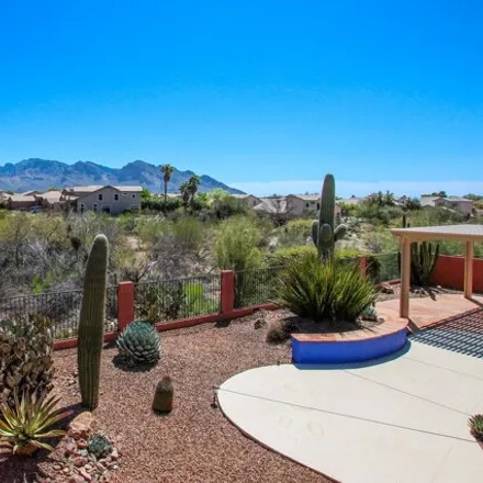 Buy this 4 bed house on 11084 North Canada Ridge Drive in Oro Valley, AZ 85737