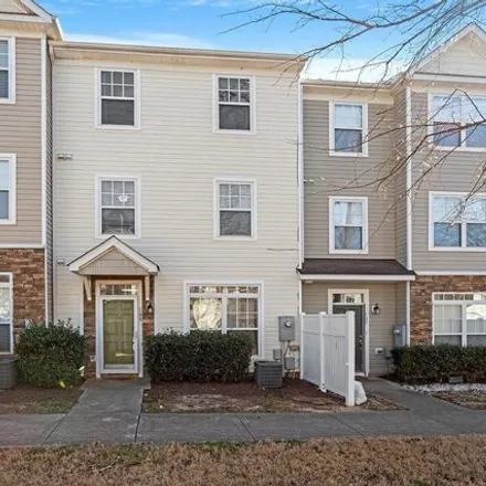 Rent this 3 bed townhouse on 1264 Canyon Rock Court in Raleigh, NC 27610