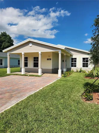 Rent this 4 bed house on 21980 Southwest 124th Avenue in Goulds, FL 33170