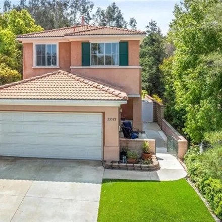 Buy this 4 bed house on 23522 Silverhawk Place in Santa Clarita, CA 91354