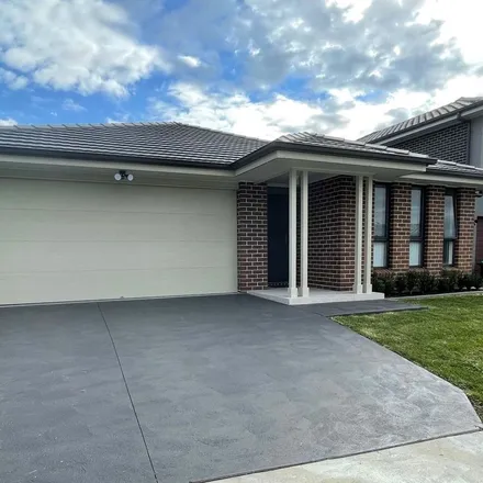 Rent this 4 bed apartment on 17 Mcmillan Street in Gregory Hills NSW 2557, Australia