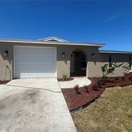Rent this 2 bed house on 7705 Bloomfield Drive in Jasmine Estates, FL 34668
