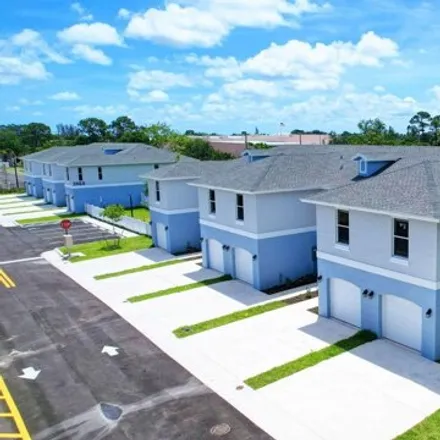 Rent this 3 bed house on 3898 Patio Court in Palm Beach County, FL 33461