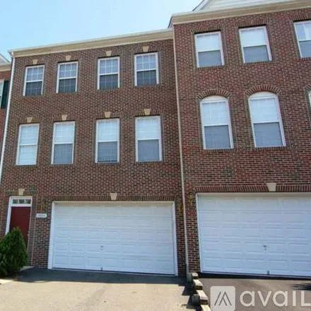 Rent this 4 bed townhouse on 13994 Sawteeth Way