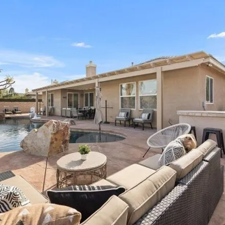 Rent this 4 bed house on Indian Palms Golf Course in Lancaster Way, Indio