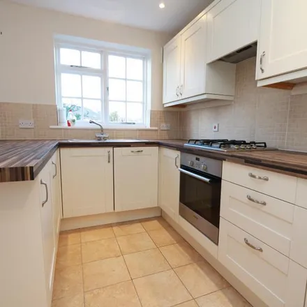 Rent this 4 bed townhouse on Selsdon Close in London, KT6 4TF