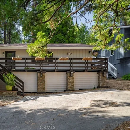 Buy this 2 bed house on 2520 Whispering Pines Drive in Running Springs, CA 92382
