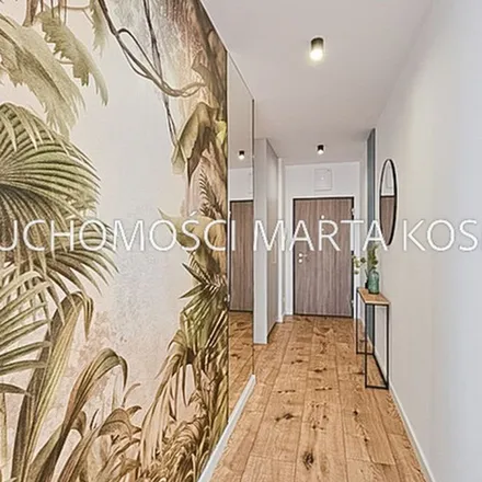 Rent this 3 bed apartment on Łopuszańska in 02-241 Warsaw, Poland