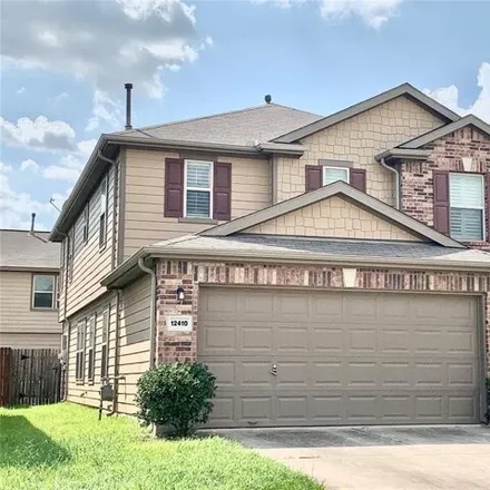 Rent this 3 bed house on 12438 Skyview Star Court in Houston, TX 77047