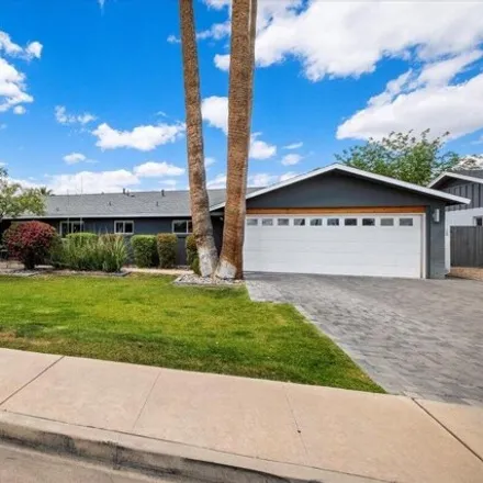 Buy this 4 bed house on 3244 East Glenrosa Avenue in Phoenix, AZ 85018