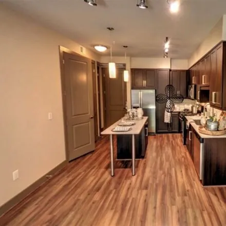 Rent this 1 bed apartment on 10458 Town and Country Way in Houston, TX 77024