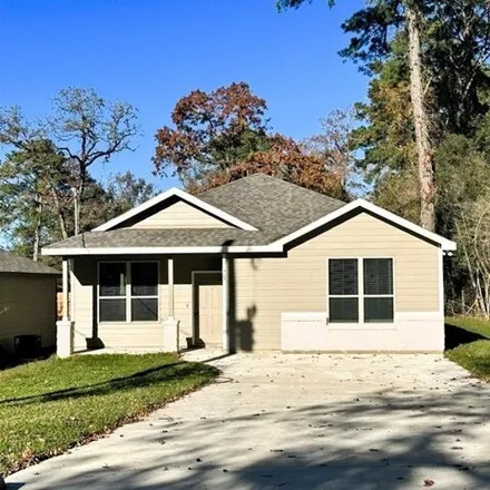 Rent this 3 bed house on 743 Natchez River Circle in Conroe, TX 77316