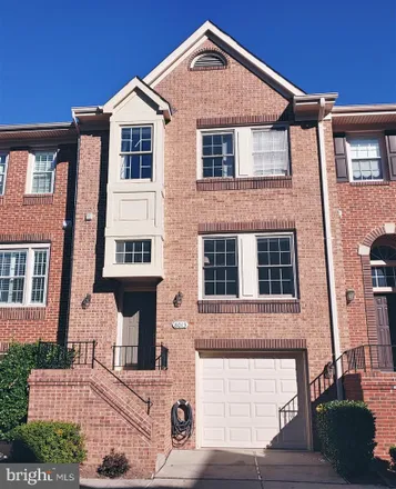 Rent this 3 bed townhouse on Merry Oaks Court in Madrillon Farms, Tysons