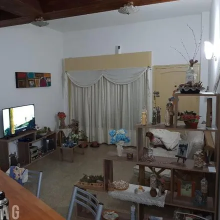 Buy this 3 bed house on Doctor Dino Carignani 465 in Departamento Santa María, Alta Gracia
