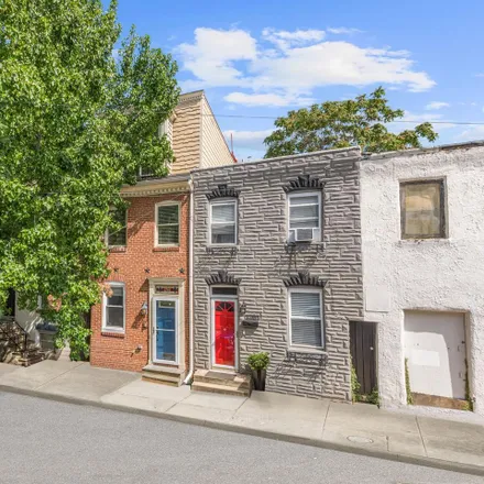 Buy this 4 bed townhouse on 2200 Cambridge Street in Baltimore, MD 21231