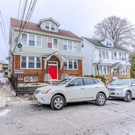 Buy this 9 bed house on 94 W Allen St in Irvington, New Jersey