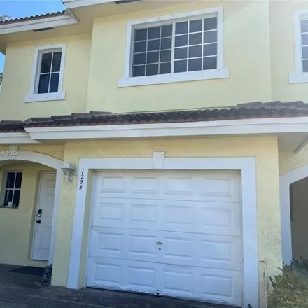 Buy this 3 bed townhouse on 1277 Imperial Lake Road in Lake Belvedere Estates, Palm Beach County