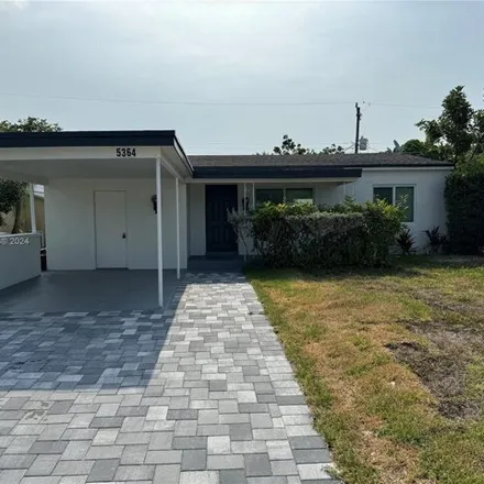 Buy this 3 bed house on 5364 Ne 3rd Ter in Oakland Park, Florida