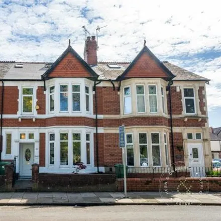 Buy this 4 bed townhouse on 20 Victoria Park Road East in Cardiff, CF5 1EG