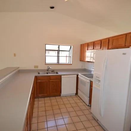 Rent this 4 bed apartment on 702 South Chimney Canyon Drive in Tucson, AZ 85748