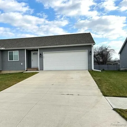 Rent this 3 bed house on 3123 Dahlia Drive in Burton, MI 48519
