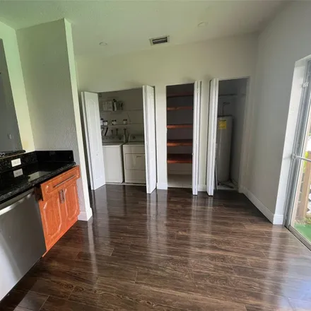 Rent this 2 bed townhouse on 7-Eleven in 1 West Flagler Street, Miami