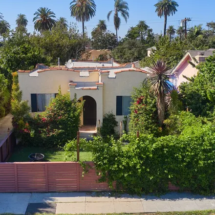 Buy this studio townhouse on 2661 South Harcourt Avenue in Los Angeles, CA 90016