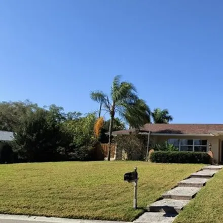 Rent this 4 bed house on 4007 Harbor Hill Drive in Harbor Bluffs, Pinellas County