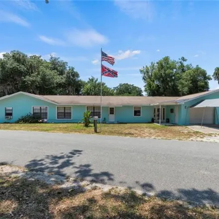 Buy this 4 bed house on 1048 County Road 452A in Sumter County, FL 33538