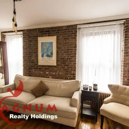 Rent this 2 bed apartment on 217 Mott Street in New York, NY 10012