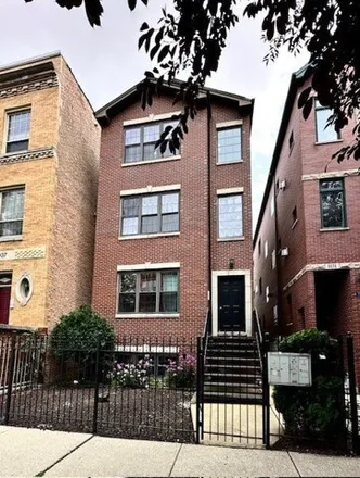 Rent this 3 bed condo on 1033 N Mozart St Apt 2 in Chicago, Illinois