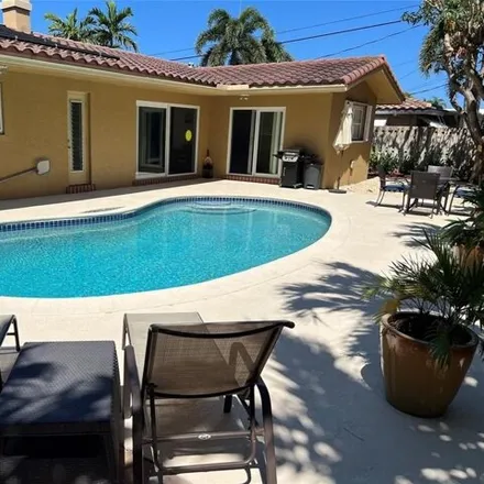 Rent this 3 bed house on 5724 Northeast 21st Avenue in Imperial Point, Fort Lauderdale