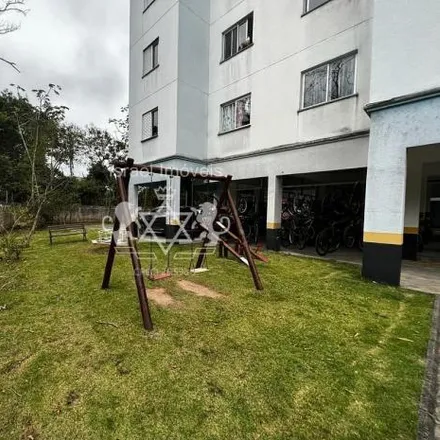Buy this 2 bed apartment on Rua Santa Rita do Passa Quatro in Martin de Sá, Caraguatatuba - SP